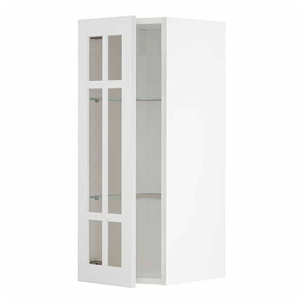 Vitt METOD köksskåp med stensundsglasdörrar, stilren och modern design.
