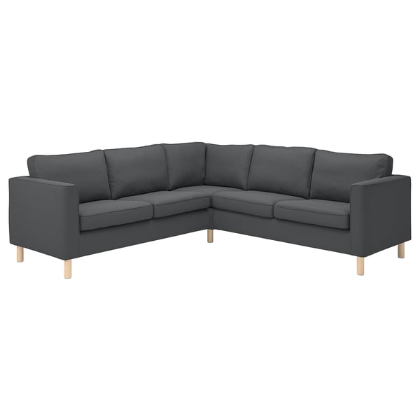 En mörkgrå hörnsoffa från PÄRUP med bred manchesterklädsel, ljusa träben och en modern, bekväm design.