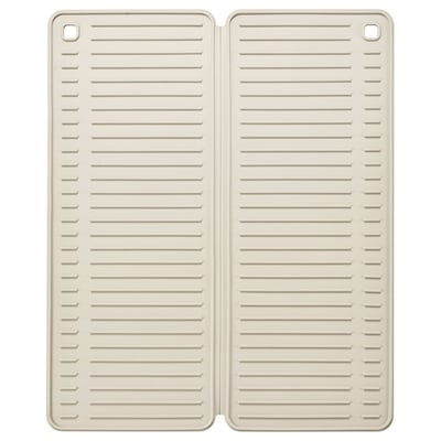 Två beige silikonmattor med horisontella räfflor placerade sida vid sida.