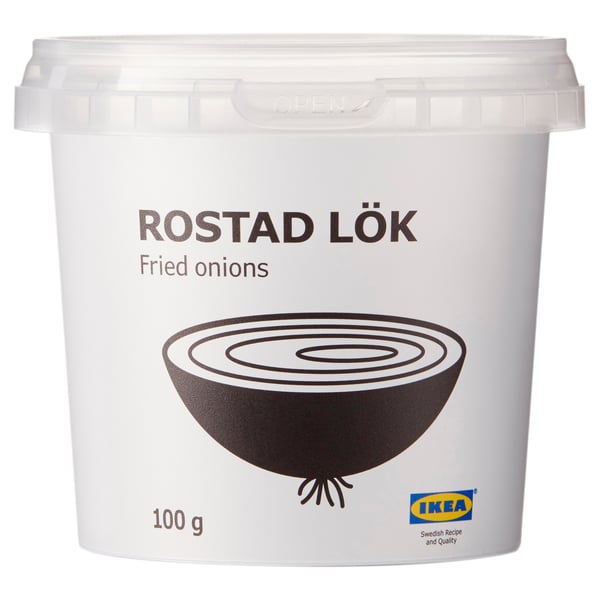 Bilden visar en behållare med ikeas rostad lok, stekt lök, som väger 100g.