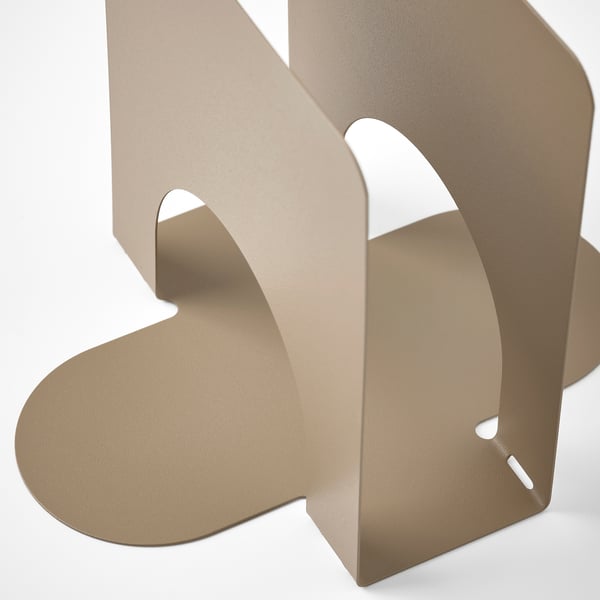 Brun metallservetthållare, elegant och snygg design, håller servetter snyggt.