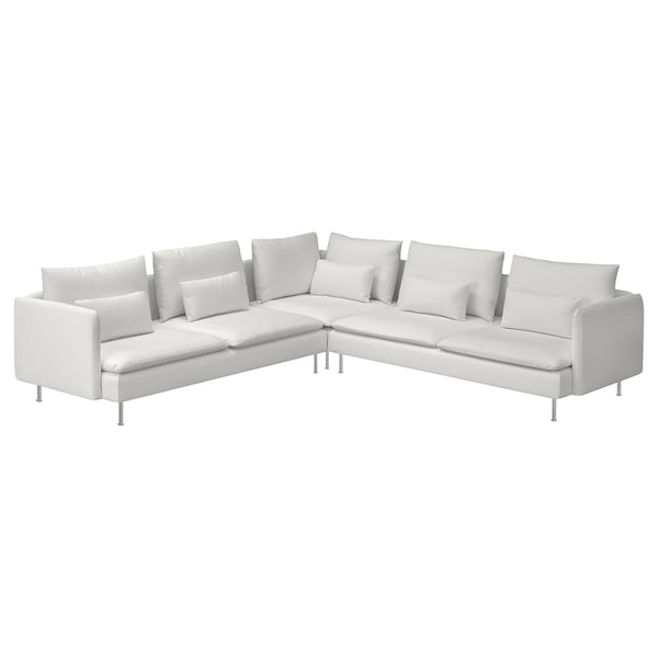 Modern vit l-formad soffa med avtagbara kuddar.