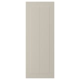 En beige STENSUND skåpdörr med en slät, inramad design.