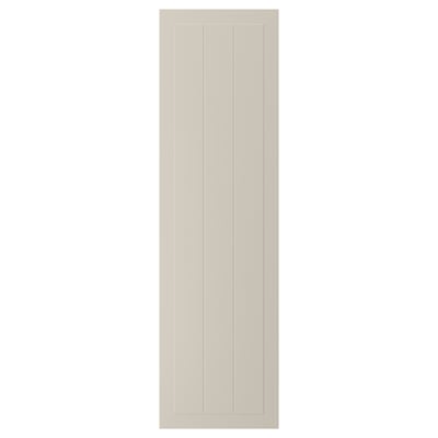 Beige STENSUND skåpdörr med horisontella spår, träfiberskiva, akryl och polyesterfärg.