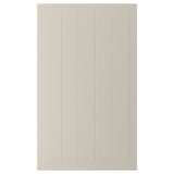 Visar en beige STENSUND skåpdörr med vertikala spår och en rektangulär ram, gjord av fiberplatta, motståndskraft mot fukt och fläckar.