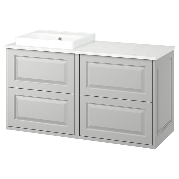 Elegant ljusgrå badrumshandfat, med fasade paneler, keramisk handfat och gott om förvaring. Väggmonterad design för rymlig känsla.