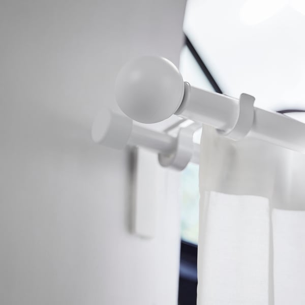 VÄSENTLIG: vit, rund, plastisk finial; Modern, minimalistisk design.