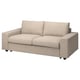 En beige VIMLE soffa med en elegant, modern design.