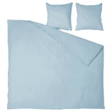 Parure de lit bleu clair avec deux oreillers. Tissu en coton doux, design uni. Parfait pour un décor de chambre apaisant.