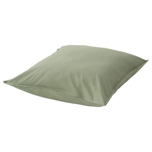 Taie d’oreiller rectangulaire vert clair avec tissu lisse.