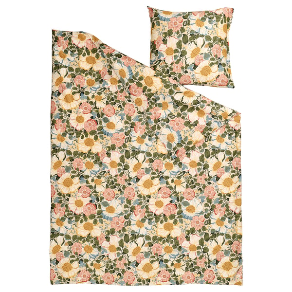 Le couette ARENBOK avec une base beige et un motif floral expressif, en coton et en lyocell, procure une sensation douce et soyeuse.