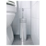 Porte-brosse de toilette chromé dans la salle de bain avec brosse remplaçable.