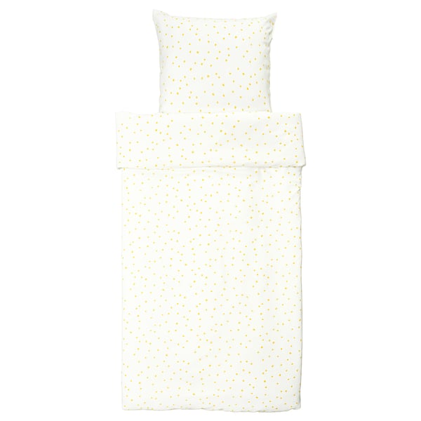 Parure de lit blanche à pois jaunes, en coton et viscose, de forme rectangulaire, comprend une housse de couette et des taies d’oreiller.