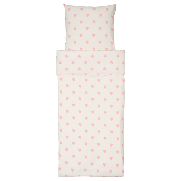 Des enfants à motifs de cœurs en literie blanche et rose. Tissu doux et mélangé en coton avec couette et oreiller.
