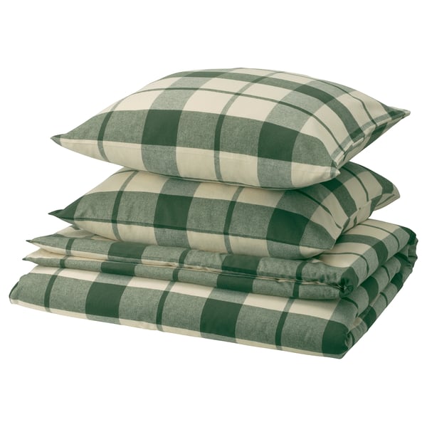 Parure de lit pliée à carreaux verts et blancs, composée de taies d’oreiller et d’une housse de couette en flanelle 100 % coton.