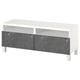 Meuble TV blanc moderne avec tiroirs effet marbre foncé, forme rectangulaire, design élégant.