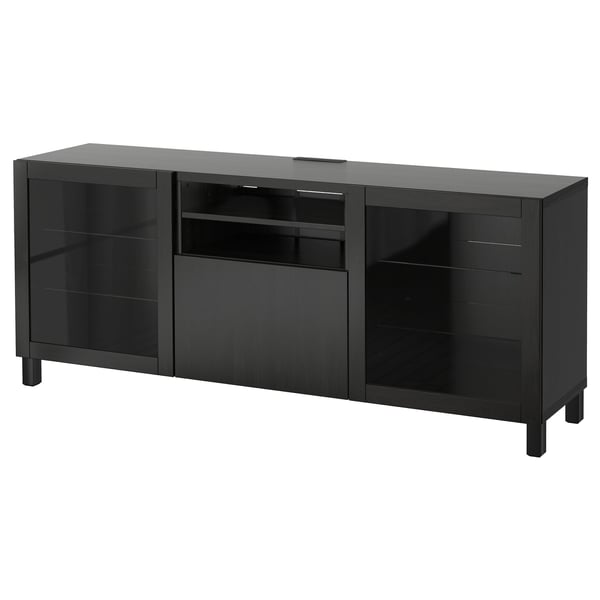 Meuble tv BESTÅ noir, design moderne et élégant avec portes en verre et cadre en bois, rangement et gestion des câbles.