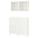 Armoire BESTÅ blanche avec portes vitrées et armoire murale en verre.