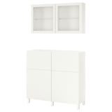 Ensemble de rangement BESTÅ blanc avec armoire murale, portes en verre et design élégant. Moderne, minimaliste et polyvalent.