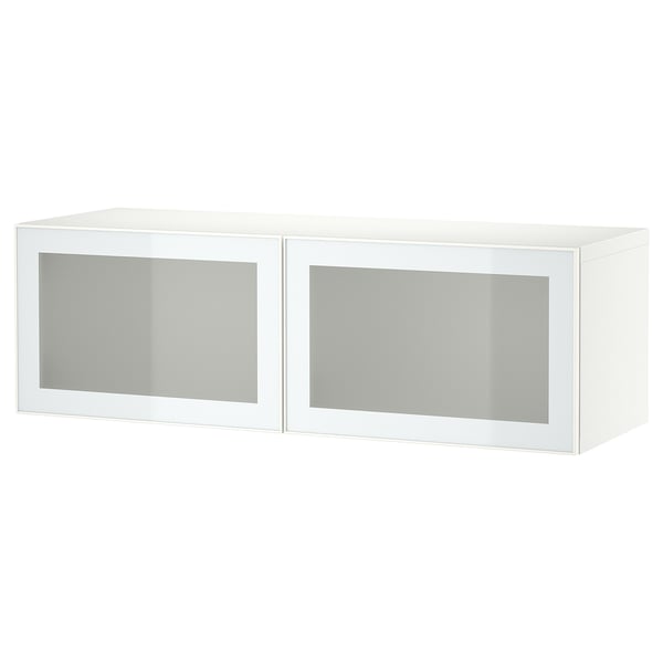 Un meuble de rangement BESTÅ blanc avec des portes en verre dépoli, au design rectangulaire et moderne.