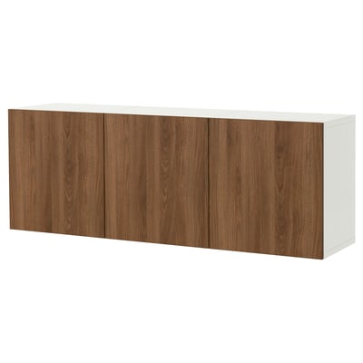 Une armoire murale BESTÅ blanche avec quatre portes veinées de bois brun et aucune poignée apparente. L’armoire est rectangulaire et conçue pour le rangement.