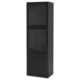 Armoire BESTÅ noire avec portes en verre, étagères et tiroirs pour le rangement et l’exposition.