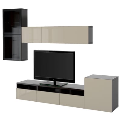 Unité de divertissement moderne : noir et beige BESTÅ, comprend un meuble TV, des armoires murales et des tiroirs. Design rectangulaire élégant avec des accents de verre et de métal.