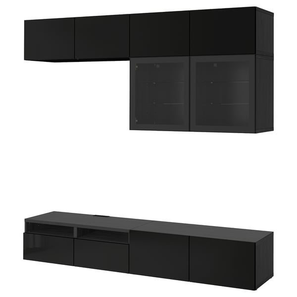 Meuble tv et armoires murales BESTÅ noirs. Design moderne et élégant avec une finition brillante. Offre un grand espace de rangement avec des étagères réglables et des portes vitrées.