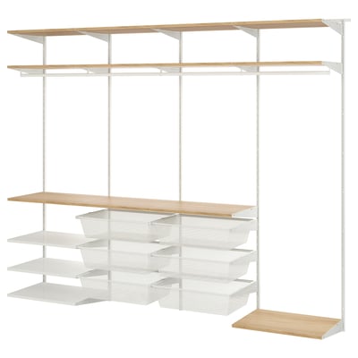 Un système de rangement BOAXEL blanc avec des étagères en bois et des tiroirs grillagés pour un rangement organisé.