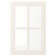 Une porte d’armoire rectangulaire blanche avec quatre panneaux biseautés dans un style classique. Il s’agit d’une surface lisse et laquée facile à nettoyer.