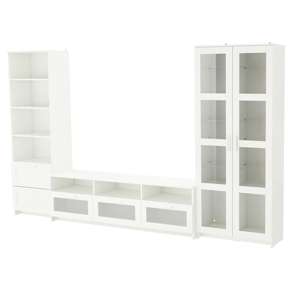 Un ensemble d’unité de rangement pour téléviseur BRIMNES blanc. Il dispose d’étagères réglables, de tiroirs et de portes vitrées pour un rangement organisé.
