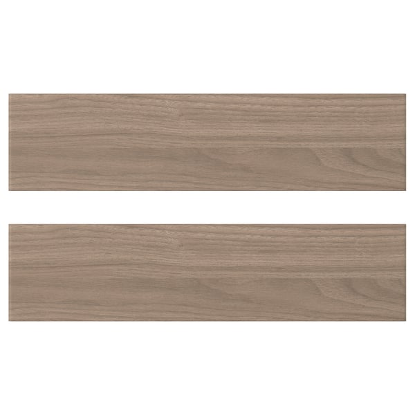 Deux panneaux de bois, brun clair, rectangulaires, texture lisse. Design BROKHULT, surface à motif noyer.