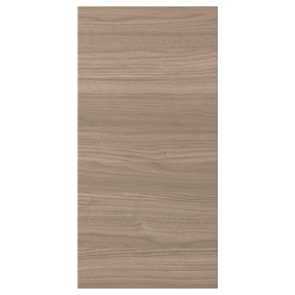 Porte d’armoire de cuisine BROKHULT à texture noyer avec des lignes droites et épurées pour un look moderne.
