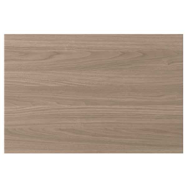 Un panneau en bois BROKHULT au fini noyer naturel, mettant en valeur une texture lisse et granuleuse.