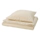Ensemble de couette plié beige et blanc DOFTAKLEJA, avec motif à carreaux cousus et rayures, entièrement plié.