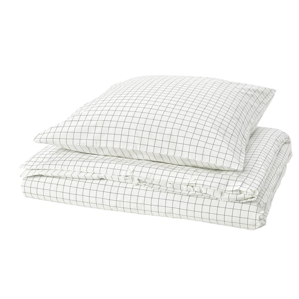 Une housse de couette DOFTAKLEJA blanche et anthracite avec motif à carreaux cousus et rayures. Il est fabriqué en 100 % coton avec des poches d’angle pour une utilisation facile.