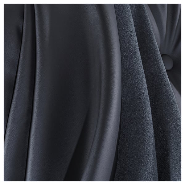Fauteuil DYVLINGE noir en gros plan, design pivotant avec tissu lisse.