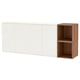 Rangement mural EKET : 3 armoires blanches, 1 unité ouverte en bois. Design moderne et minimaliste.
