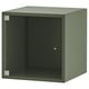 Une armoire EKET vert olive avec une porte vitrée. Il est de forme carrée et a un design élégant et moderne.
