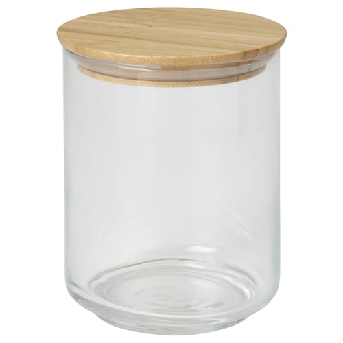 Pot en verre transparent avec couvercle en bambou pour la conservation des aliments secs.