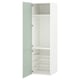 Armoire ENHET blanche avec portes vertes et paniers en fil métallique