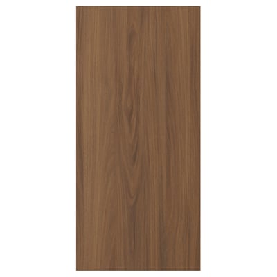 Cette image montre un panneau de bois de couleur noyer FÖRBÄTTRA avec une surface lisse, doté d’un design moderne classique.