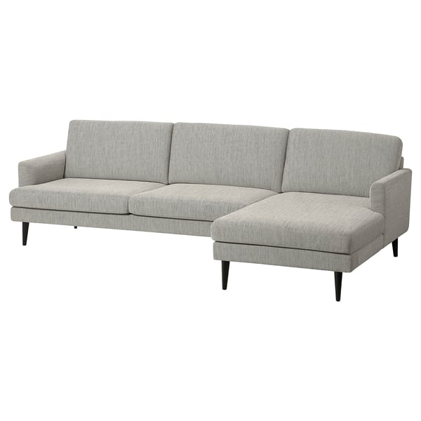 Un canapé GRILLSTORP gris moderne avec une chaise, aux lignes épurées et aux coussins confortables.
