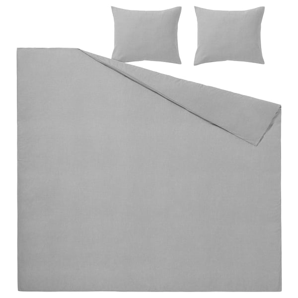 Parure de lit en flanelle de coton gris avec housse de couette et taies d’oreiller au design minimaliste.