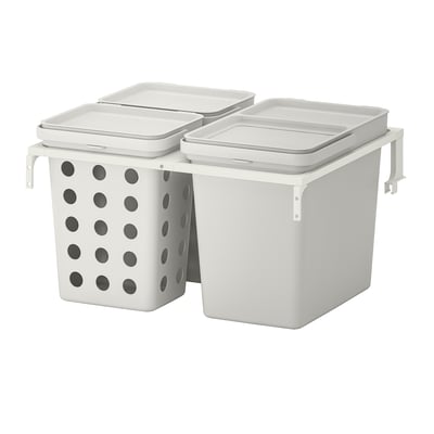 Deux poubelles blanches, dont une avec des trous, montées côte à côte sur un cadre de support.