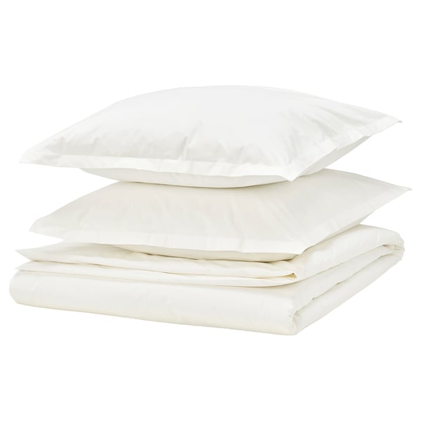 Un ensemble de couette HAMPFLOCKEL blanc avec un tissage en percale de coton impeccable, avec des taies d’oreiller avec des rebords décoratifs et une couette pliée au bas.