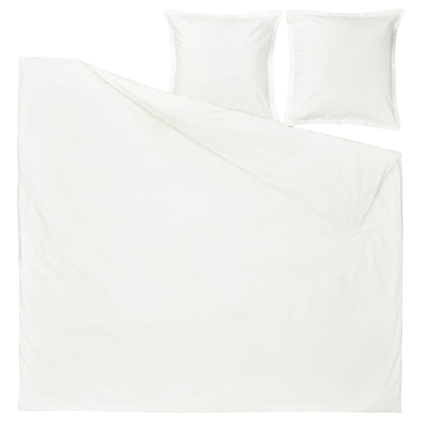 Une housse de couette et des taies d’oreiller HAMPFLOCKEL blanches en percale de coton impeccable, conçues avec un look sophistiqué, naturel et durable.