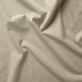 Tissu de rideau en coton beige ; lisse, légèrement froncé, montrant la texture et la qualité.