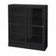 Une vitrine HAVSTA noire en pin avec des portes et des étagères en verre, présentant un design rectangulaire et épuré.