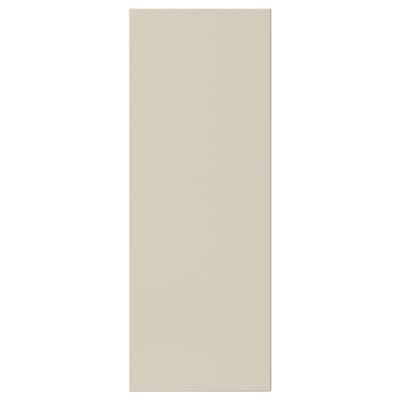 Affiche une façade HAVSTORP beige, rectangulaire, aux lignes douces, réalisée à partir de peinture acrylique et de panneaux de fibres pour un design de cuisine moderne et neutre.